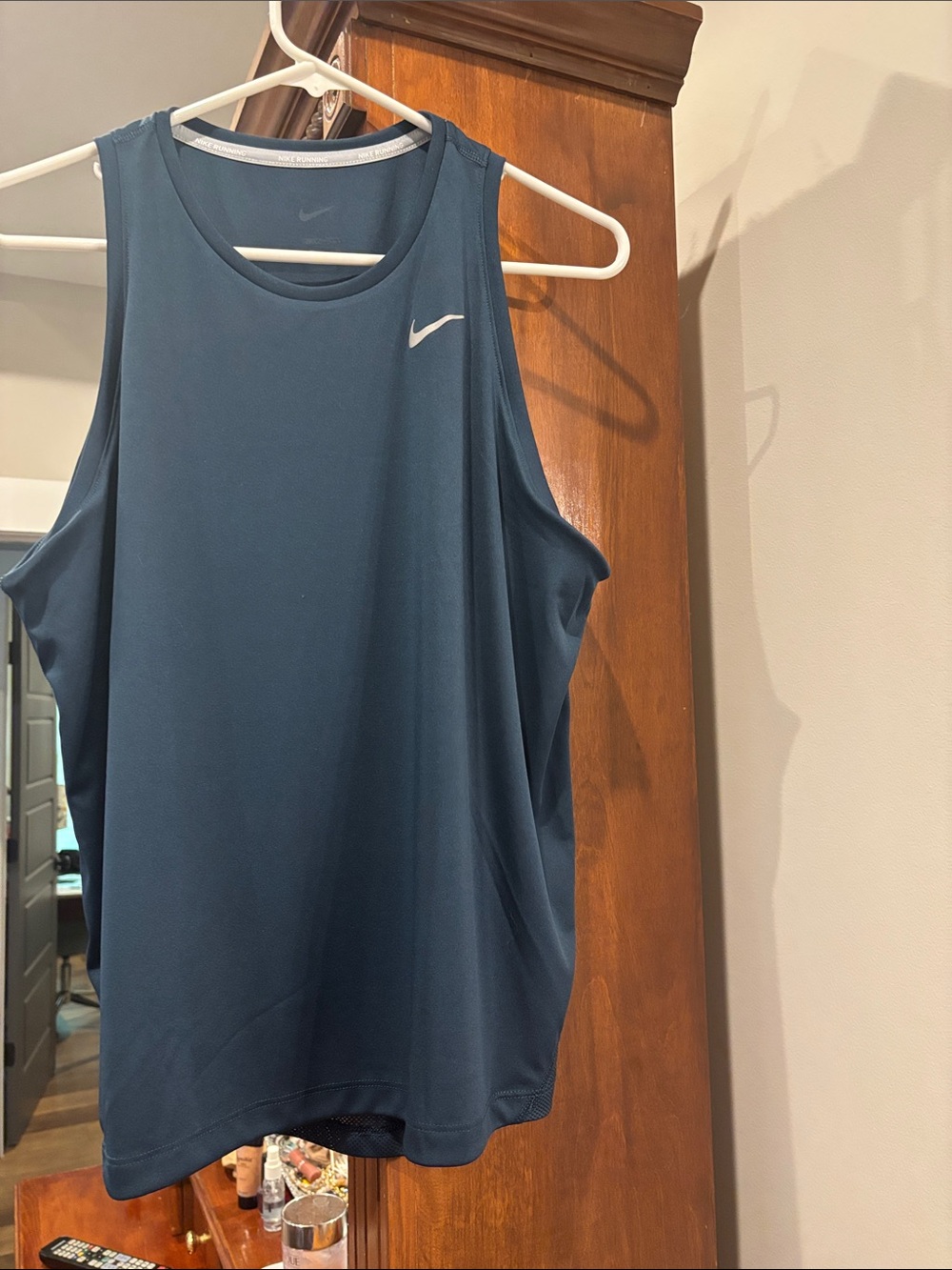 Nike women’s Teal Blue Swim Tank with White Swoosh